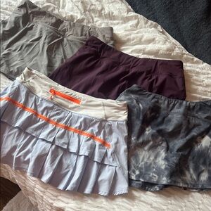 3 CRZ yoga (M) 1 lululemon (size 6) Set of Four Athletic Skirts